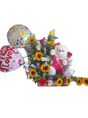 Arreglo de 18 flores variadas con peluche, chocolates y 2 globos